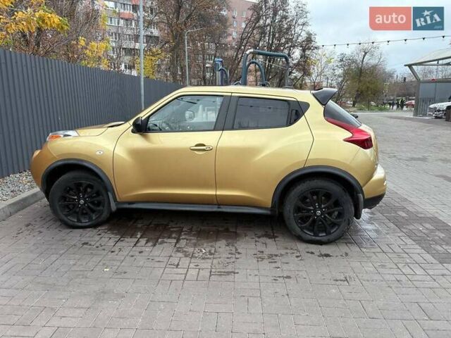 Желтый Ниссан Жук, объемом двигателя 1.6 л и пробегом 168 тыс. км за 9700 $, фото 1 на Automoto.ua