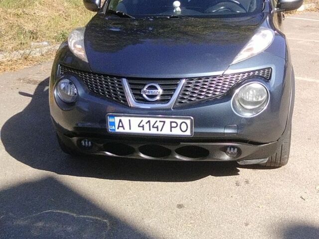 Синий Ниссан Жук, объемом двигателя 1.6 л и пробегом 204 тыс. км за 8800 $, фото 1 на Automoto.ua