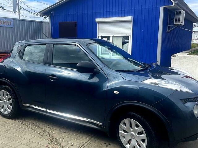 Синій Ніссан Жук, об'ємом двигуна 1.6 л та пробігом 170 тис. км за 8500 $, фото 1 на Automoto.ua