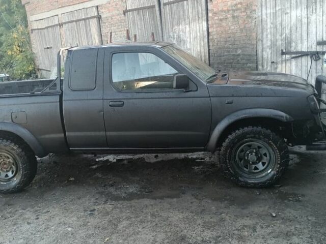 Чорний Ніссан Кінг Каб, об'ємом двигуна 2.5 л та пробігом 300 тис. км за 3738 $, фото 1 на Automoto.ua