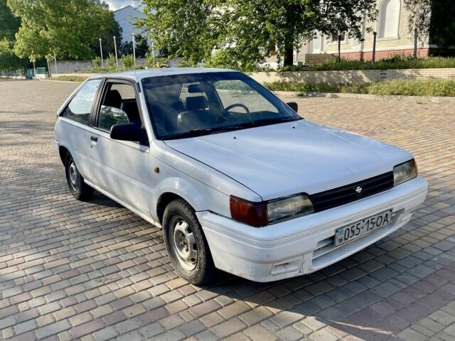 Белый Ниссан Лэнгли, объемом двигателя 1.6 л и пробегом 333 тыс. км за 750 $, фото 1 на Automoto.ua