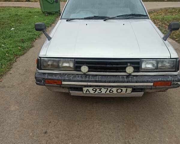 Серый Ниссан Лэнгли, объемом двигателя 0 л и пробегом 160 тыс. км за 1500 $, фото 1 на Automoto.ua