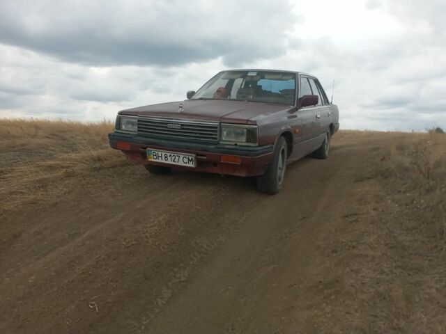 Красный Ниссан Лаурел, объемом двигателя 2.8 л и пробегом 500 тыс. км за 1300 $, фото 1 на Automoto.ua