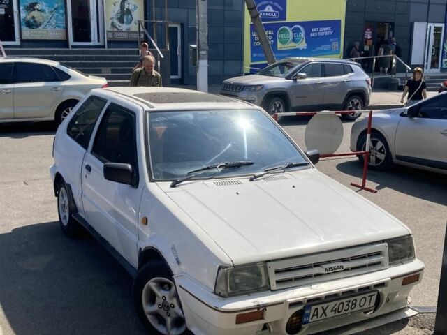 Белый Ниссан Марч, объемом двигателя 1 л и пробегом 290 тыс. км за 1071 $, фото 1 на Automoto.ua