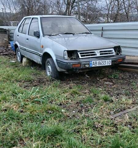 Сірий Ніссан Марч, об'ємом двигуна 1.2 л та пробігом 198 тис. км за 600 $, фото 1 на Automoto.ua