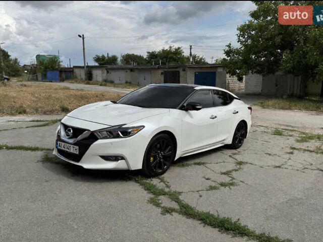 Белый Ниссан Максима, объемом двигателя 3.5 л и пробегом 225 тыс. км за 13500 $, фото 1 на Automoto.ua