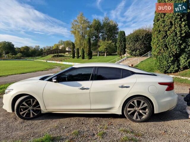 Белый Ниссан Максима, объемом двигателя 3.5 л и пробегом 135 тыс. км за 15000 $, фото 1 на Automoto.ua