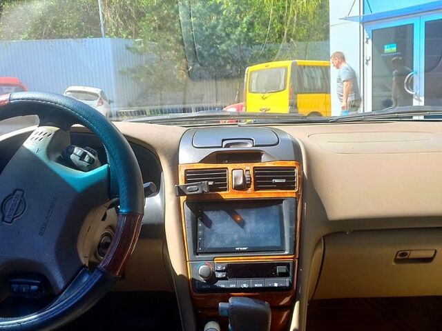 Бежевый Ниссан Максима, объемом двигателя 3 л и пробегом 316 тыс. км за 3700 $, фото 1 на Automoto.ua