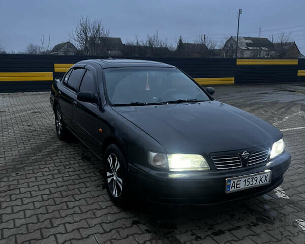 Черный Ниссан Максима, объемом двигателя 2 л и пробегом 450 тыс. км за 2250 $, фото 1 на Automoto.ua