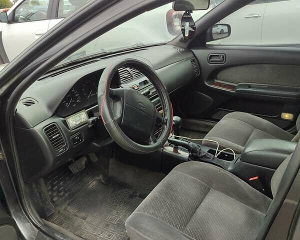 Чорний Ніссан Максіма, об'ємом двигуна 2 л та пробігом 296 тис. км за 2900 $, фото 1 на Automoto.ua