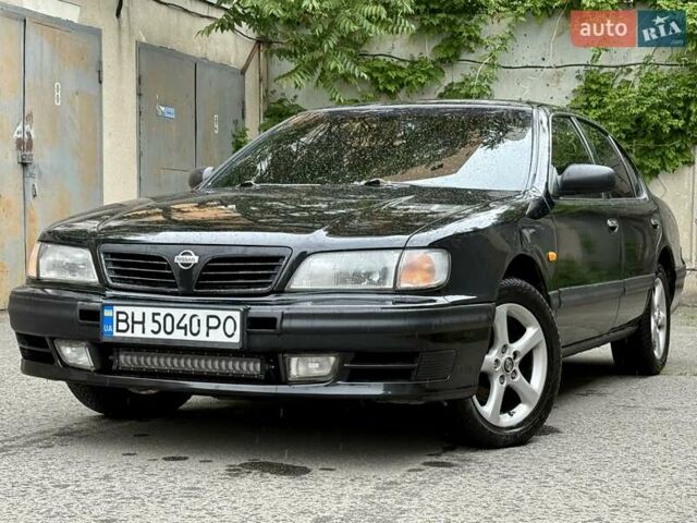 Черный Ниссан Максима, объемом двигателя 2 л и пробегом 302 тыс. км за 1999 $, фото 1 на Automoto.ua