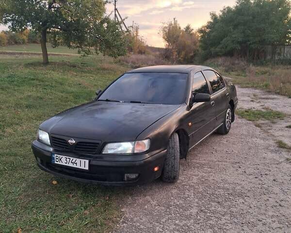 Чорний Ніссан Максіма, об'ємом двигуна 2 л та пробігом 290 тис. км за 1500 $, фото 1 на Automoto.ua