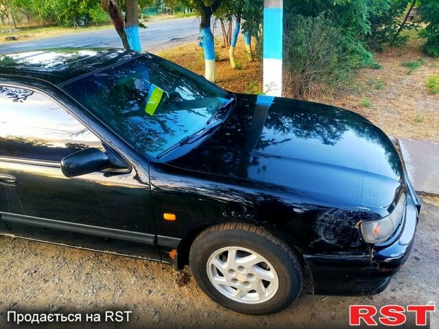 Черный Ниссан Максима, объемом двигателя 2 л и пробегом 270 тыс. км за 1700 $, фото 1 на Automoto.ua