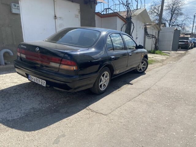 Черный Ниссан Максима, объемом двигателя 3 л и пробегом 243 тыс. км за 1150 $, фото 1 на Automoto.ua