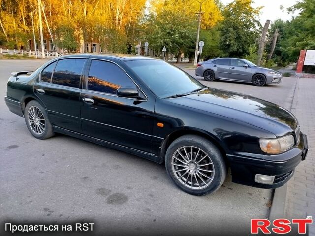 Черный Ниссан Максима, объемом двигателя 3 л и пробегом 403 тыс. км за 2500 $, фото 1 на Automoto.ua