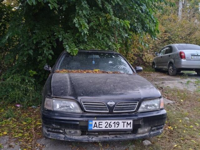 Черный Ниссан Максима, объемом двигателя 2 л и пробегом 300 тыс. км за 1000 $, фото 1 на Automoto.ua