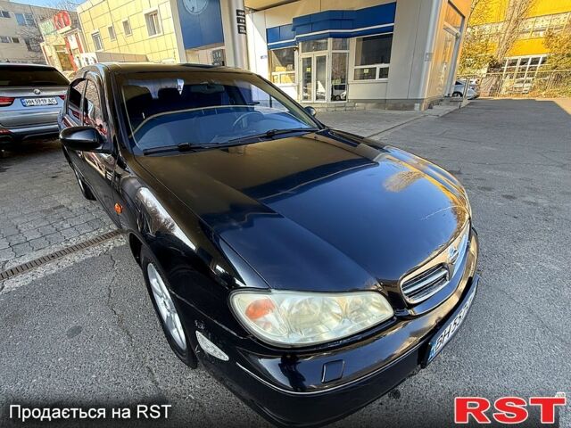 Черный Ниссан Максима, объемом двигателя 2 л и пробегом 241 тыс. км за 2200 $, фото 1 на Automoto.ua