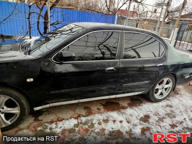 Черный Ниссан Максима, объемом двигателя 30 л и пробегом 274 тыс. км за 2000 $, фото 1 на Automoto.ua