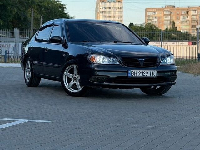 Черный Ниссан Максима, объемом двигателя 3 л и пробегом 250 тыс. км за 3850 $, фото 1 на Automoto.ua