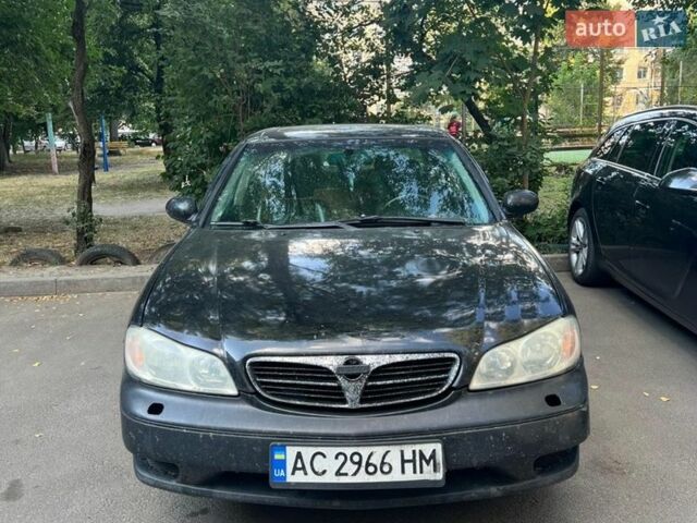 Черный Ниссан Максима, объемом двигателя 2 л и пробегом 500 тыс. км за 2300 $, фото 1 на Automoto.ua