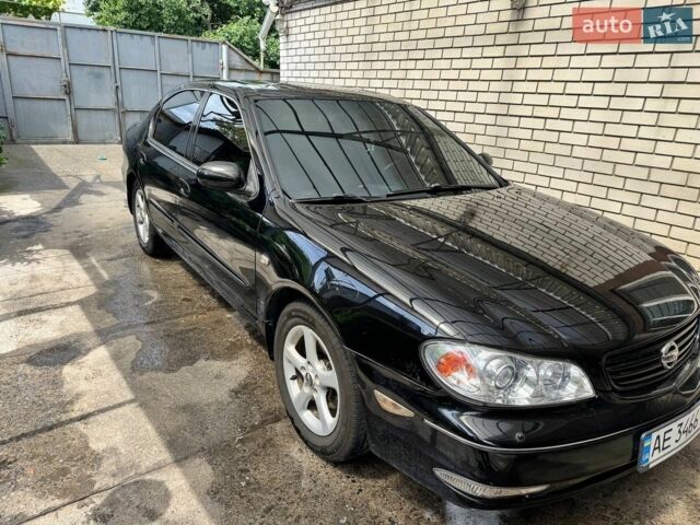 Черный Ниссан Максима, объемом двигателя 3 л и пробегом 350 тыс. км за 4000 $, фото 1 на Automoto.ua