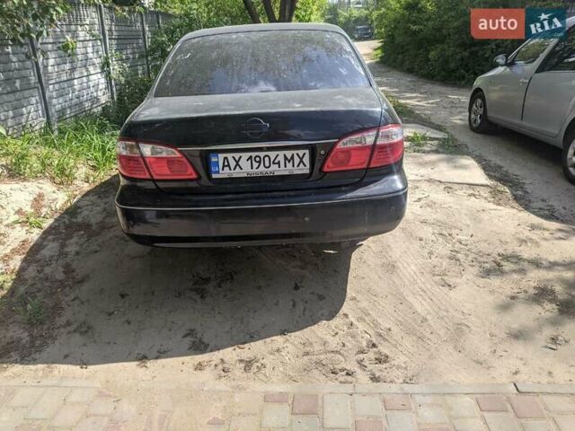 Чорний Ніссан Максіма, об'ємом двигуна 3 л та пробігом 464 тис. км за 3800 $, фото 1 на Automoto.ua