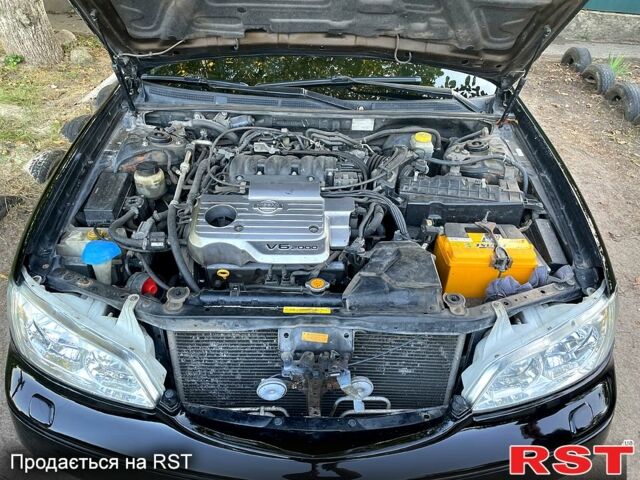 Черный Ниссан Максима, объемом двигателя 2 л и пробегом 263 тыс. км за 4000 $, фото 1 на Automoto.ua