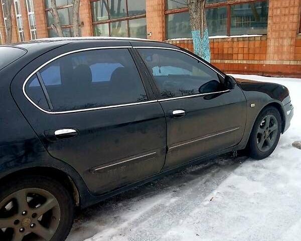 Чорний Ніссан Максіма, об'ємом двигуна 3 л та пробігом 300 тис. км за 4000 $, фото 1 на Automoto.ua