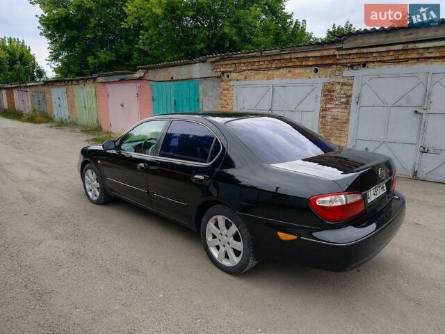 Чорний Ніссан Максіма, об'ємом двигуна 2 л та пробігом 390 тис. км за 3900 $, фото 1 на Automoto.ua