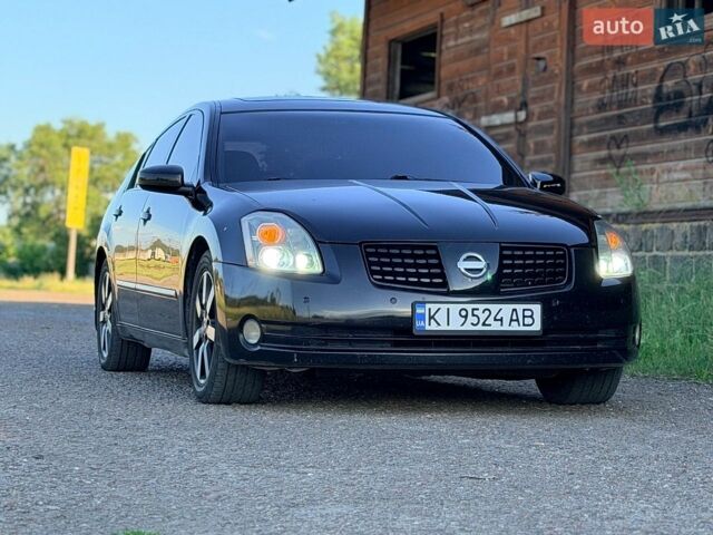 Чорний Ніссан Максіма, об'ємом двигуна 3.5 л та пробігом 396 тис. км за 3999 $, фото 1 на Automoto.ua