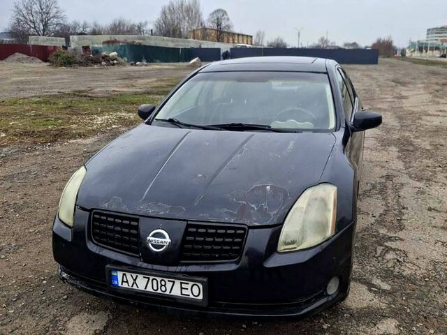 Чорний Ніссан Максіма, об'ємом двигуна 3.5 л та пробігом 200 тис. км за 2700 $, фото 1 на Automoto.ua