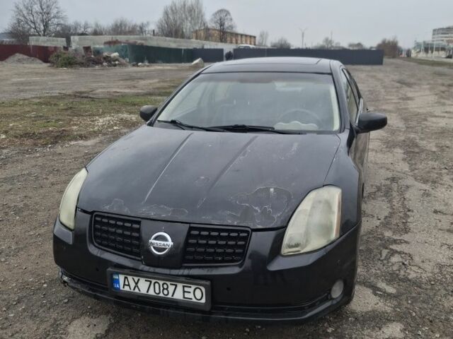 Черный Ниссан Максима, объемом двигателя 3.5 л и пробегом 200 тыс. км за 2700 $, фото 1 на Automoto.ua