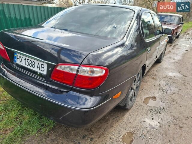 Черный Ниссан Максима, объемом двигателя 2 л и пробегом 337 тыс. км за 2500 $, фото 1 на Automoto.ua