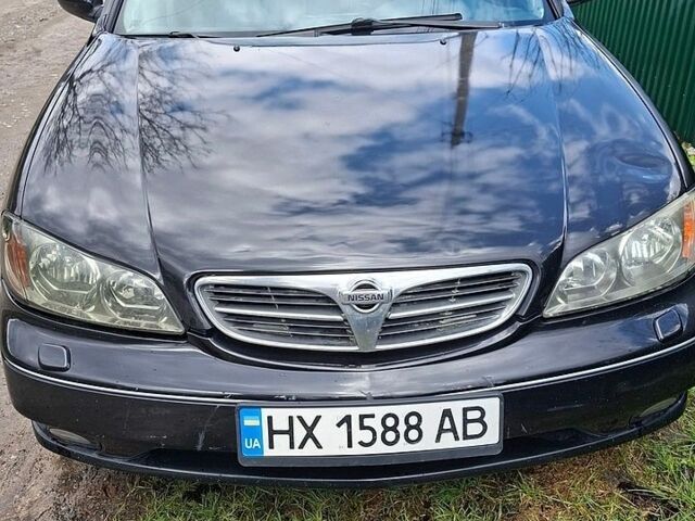 Черный Ниссан Максима, объемом двигателя 2 л и пробегом 385 тыс. км за 2500 $, фото 1 на Automoto.ua