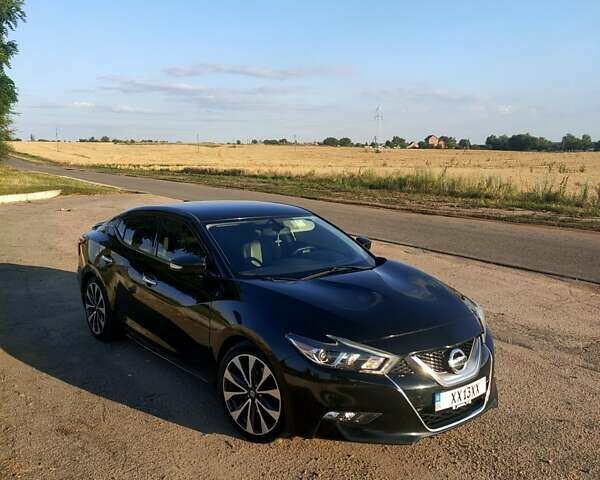 Черный Ниссан Максима, объемом двигателя 3.5 л и пробегом 150 тыс. км за 15300 $, фото 1 на Automoto.ua