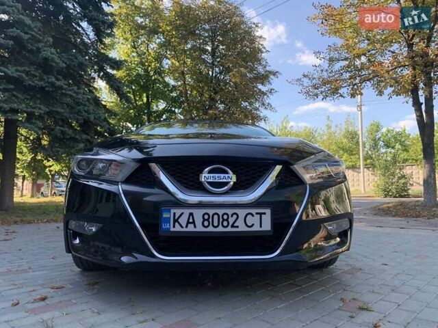 Черный Ниссан Максима, объемом двигателя 3.5 л и пробегом 127 тыс. км за 16650 $, фото 1 на Automoto.ua