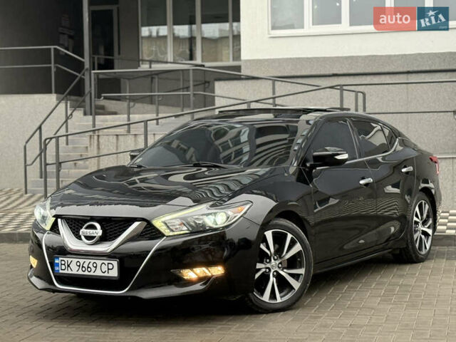 Черный Ниссан Максима, объемом двигателя 3.5 л и пробегом 102 тыс. км за 14900 $, фото 1 на Automoto.ua