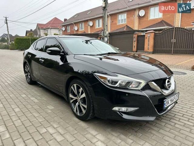 Черный Ниссан Максима, объемом двигателя 3.5 л и пробегом 107 тыс. км за 16900 $, фото 1 на Automoto.ua