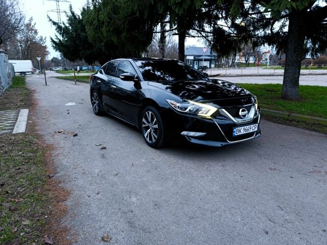 Черный Ниссан Максима, объемом двигателя 3.5 л и пробегом 107 тыс. км за 16000 $, фото 1 на Automoto.ua