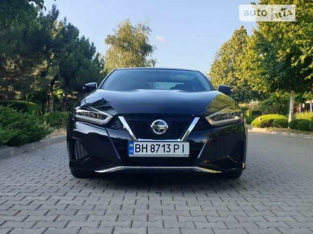 Черный Ниссан Максима, объемом двигателя 3.5 л и пробегом 77 тыс. км за 18500 $, фото 1 на Automoto.ua