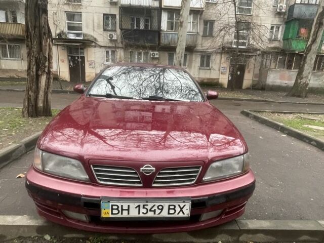 Червоний Ніссан Максіма, об'ємом двигуна 3 л та пробігом 378 тис. км за 1650 $, фото 1 на Automoto.ua