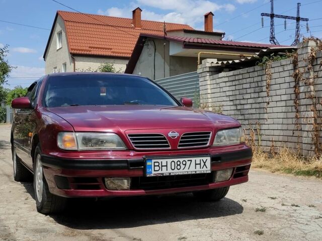 Красный Ниссан Максима, объемом двигателя 2 л и пробегом 449 тыс. км за 3300 $, фото 1 на Automoto.ua