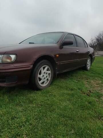 Червоний Ніссан Максіма, об'ємом двигуна 2 л та пробігом 390 тис. км за 2500 $, фото 1 на Automoto.ua