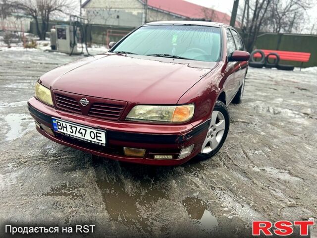 Червоний Ніссан Максіма, об'ємом двигуна 2 л та пробігом 200 тис. км за 2200 $, фото 1 на Automoto.ua