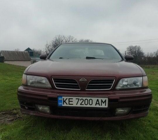 Червоний Ніссан Максіма, об'ємом двигуна 2 л та пробігом 390 тис. км за 2500 $, фото 1 на Automoto.ua