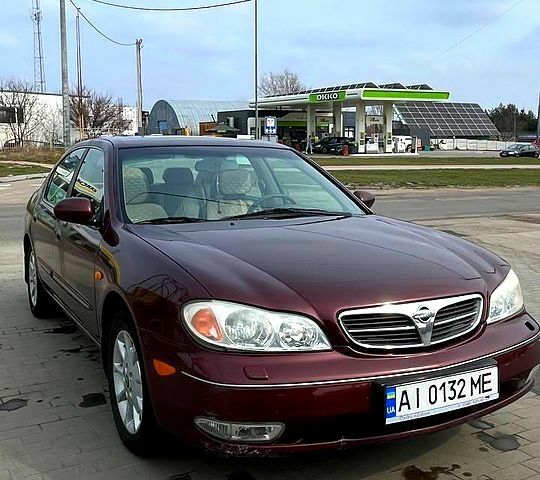 Красный Ниссан Максима, объемом двигателя 2 л и пробегом 250 тыс. км за 2500 $, фото 1 на Automoto.ua