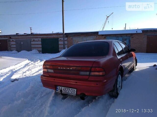 Красный Ниссан Максима, объемом двигателя 2.5 л и пробегом 100 тыс. км за 3000 $, фото 1 на Automoto.ua