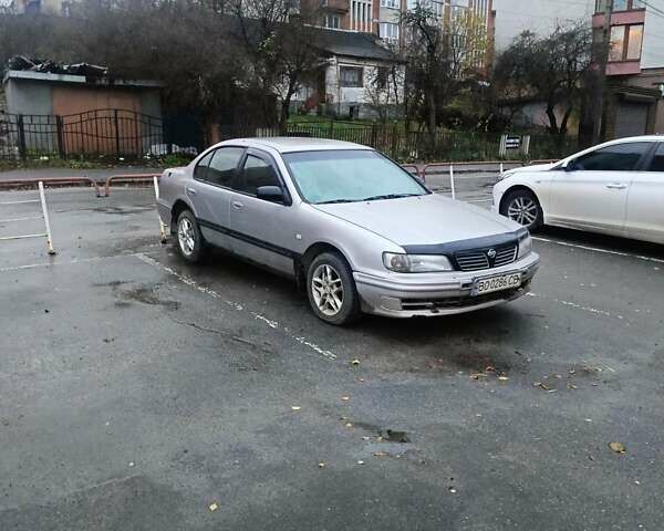 Серый Ниссан Максима, объемом двигателя 2 л и пробегом 284 тыс. км за 1000 $, фото 1 на Automoto.ua