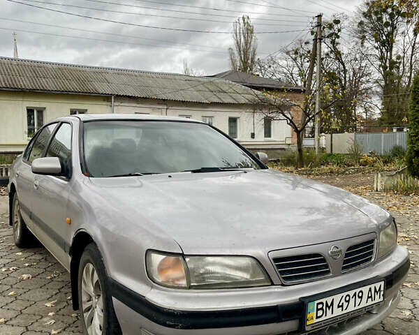 Сірий Ніссан Максіма, об'ємом двигуна 2 л та пробігом 480 тис. км за 1450 $, фото 1 на Automoto.ua