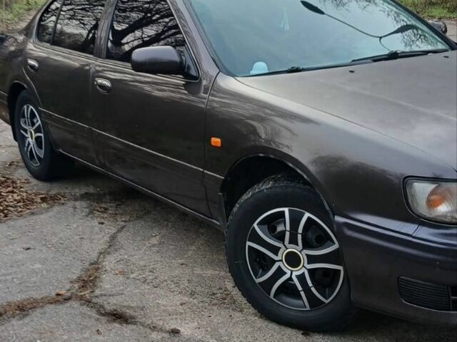 Сірий Ніссан Максіма, об'ємом двигуна 3 л та пробігом 300 тис. км за 2600 $, фото 1 на Automoto.ua